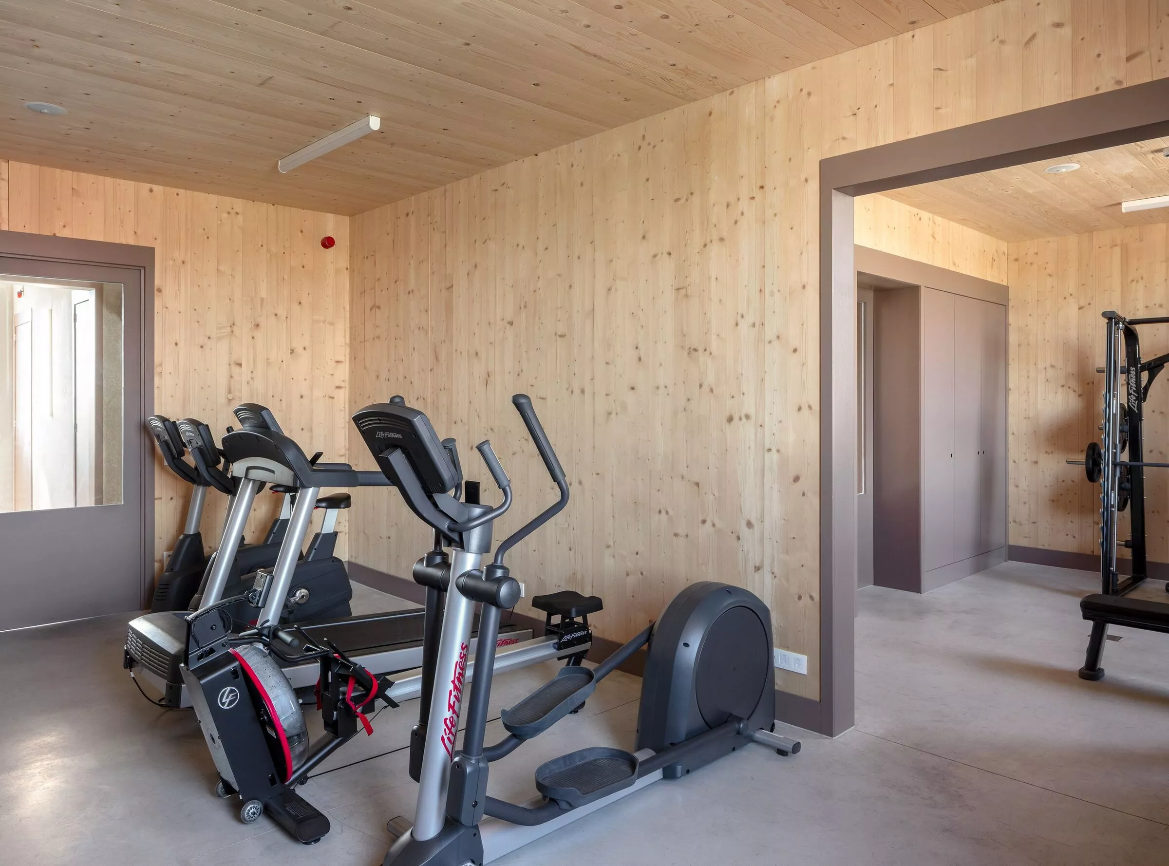 Fire Station Wilrijk's upstairs residential area includes a gym