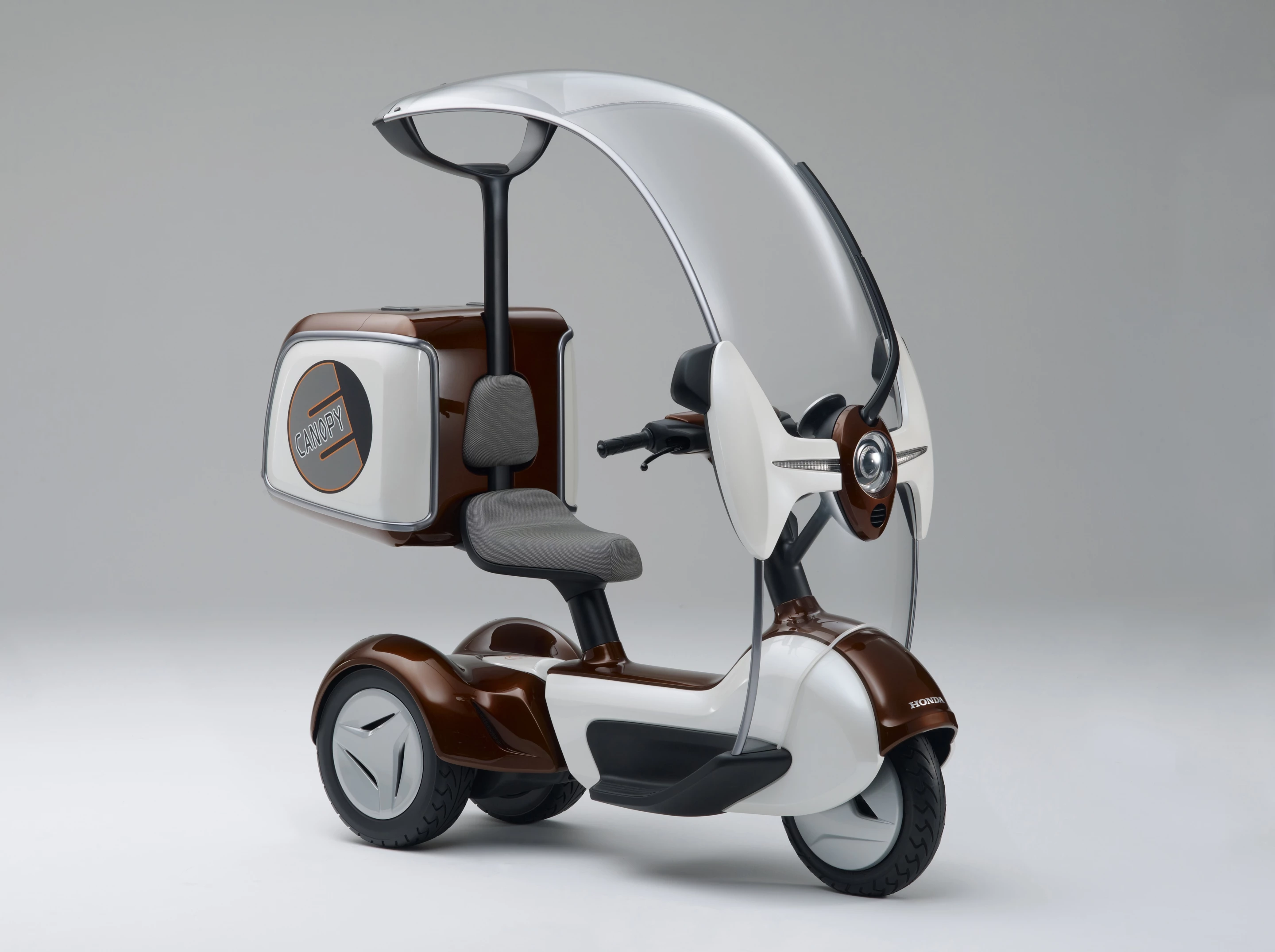 Honda's E-CANOPY with carrier box. In Japan, there's a whole industry building bodies for the Canopy.