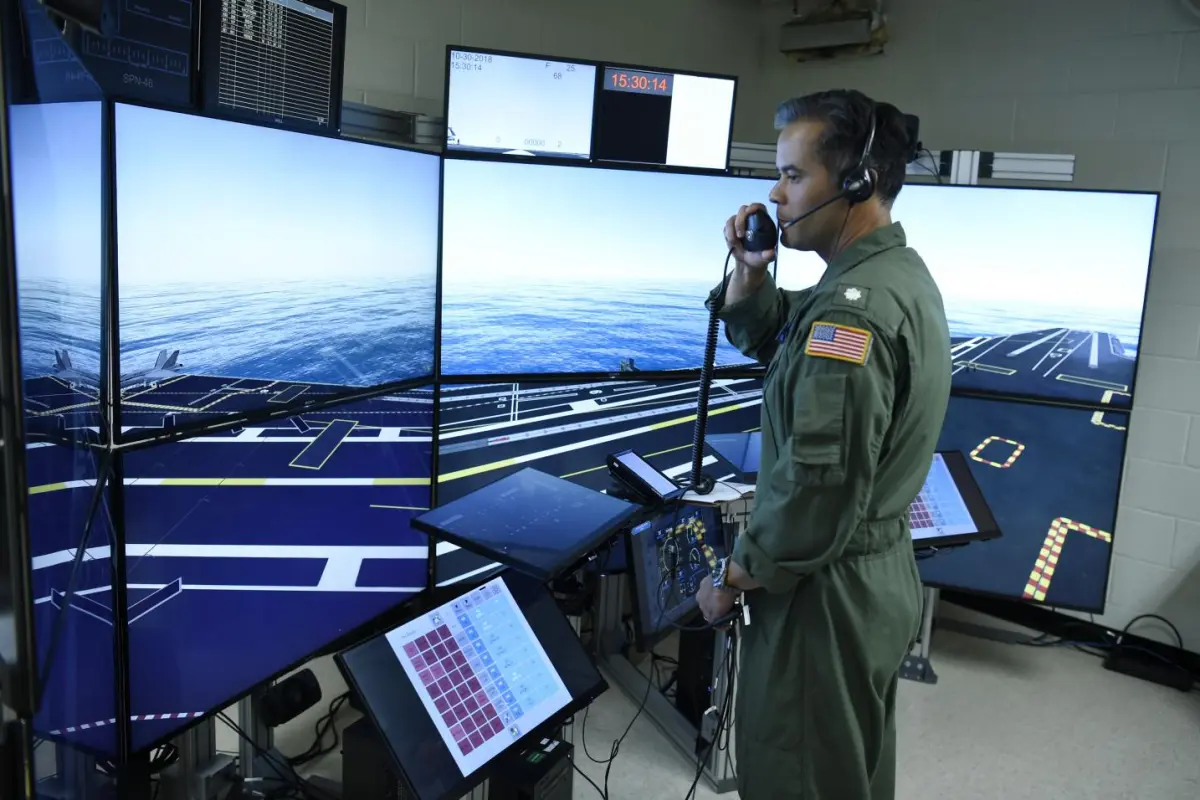 Commander Jason Cassisi, air boss aboard the aircraft carrier USS George H.W. Bush (CVN 77) participates in a final prototype demonstration of the Office of Naval Research (ONR) TechSolutions-sponsored Flight Deck Crew Refresher Training Expansion Packs (TEP)