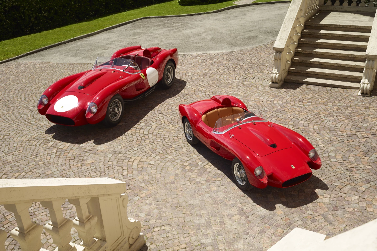 The Ferrari Testa Rossa J (front right) is a special project built by Ferrari in collaboration with The Little Car Company. That's a genuine $30 million 1957 Testa Rossa at the rear.