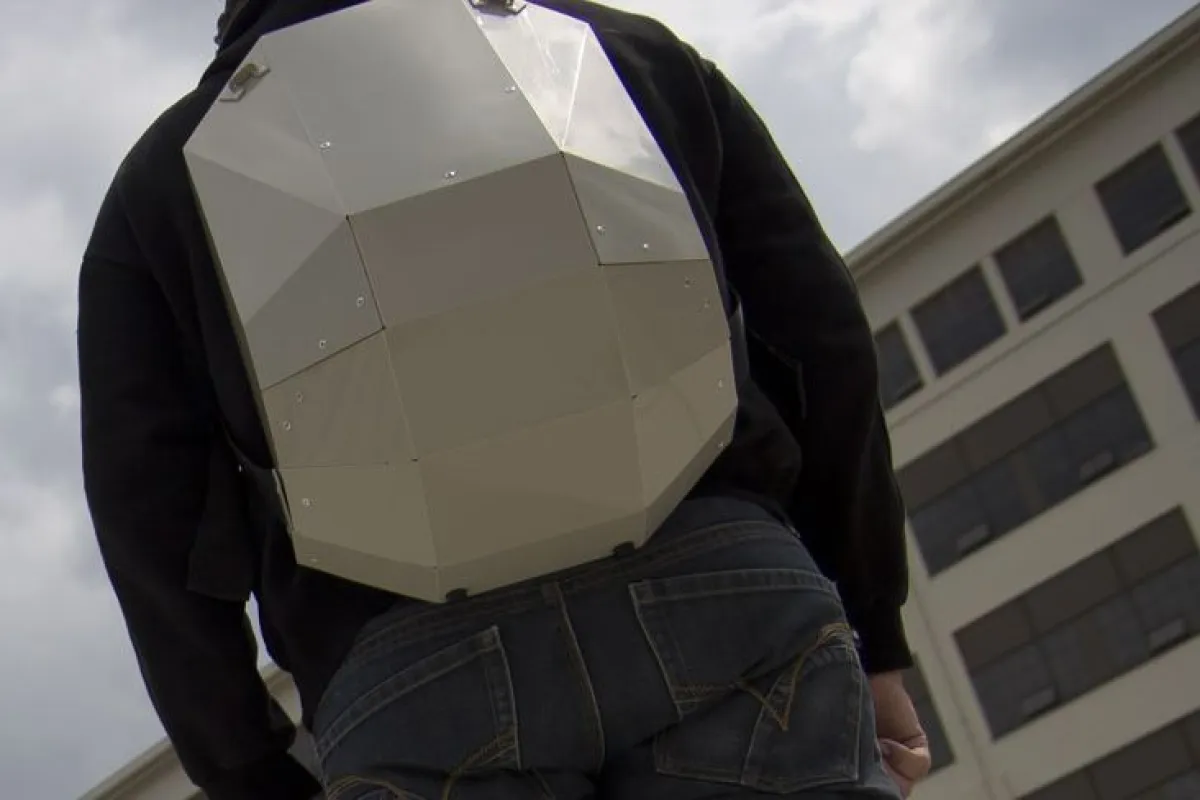 The Solid Gray backpack features a rigid foldable design, and is made from a single sheet of copolymer