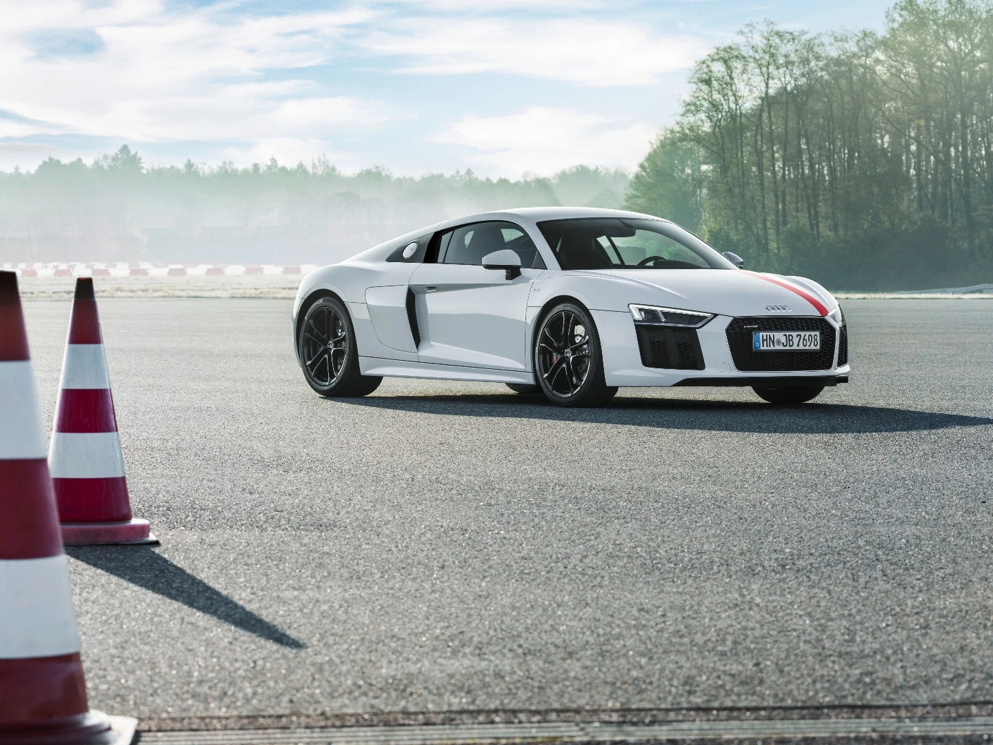 The Audi R8 V10 RWS: Flicking into Dynamic Mode loosens the grip of Stability Control for "controlled drifts," although the company says the system will still intervene if things get out of hand