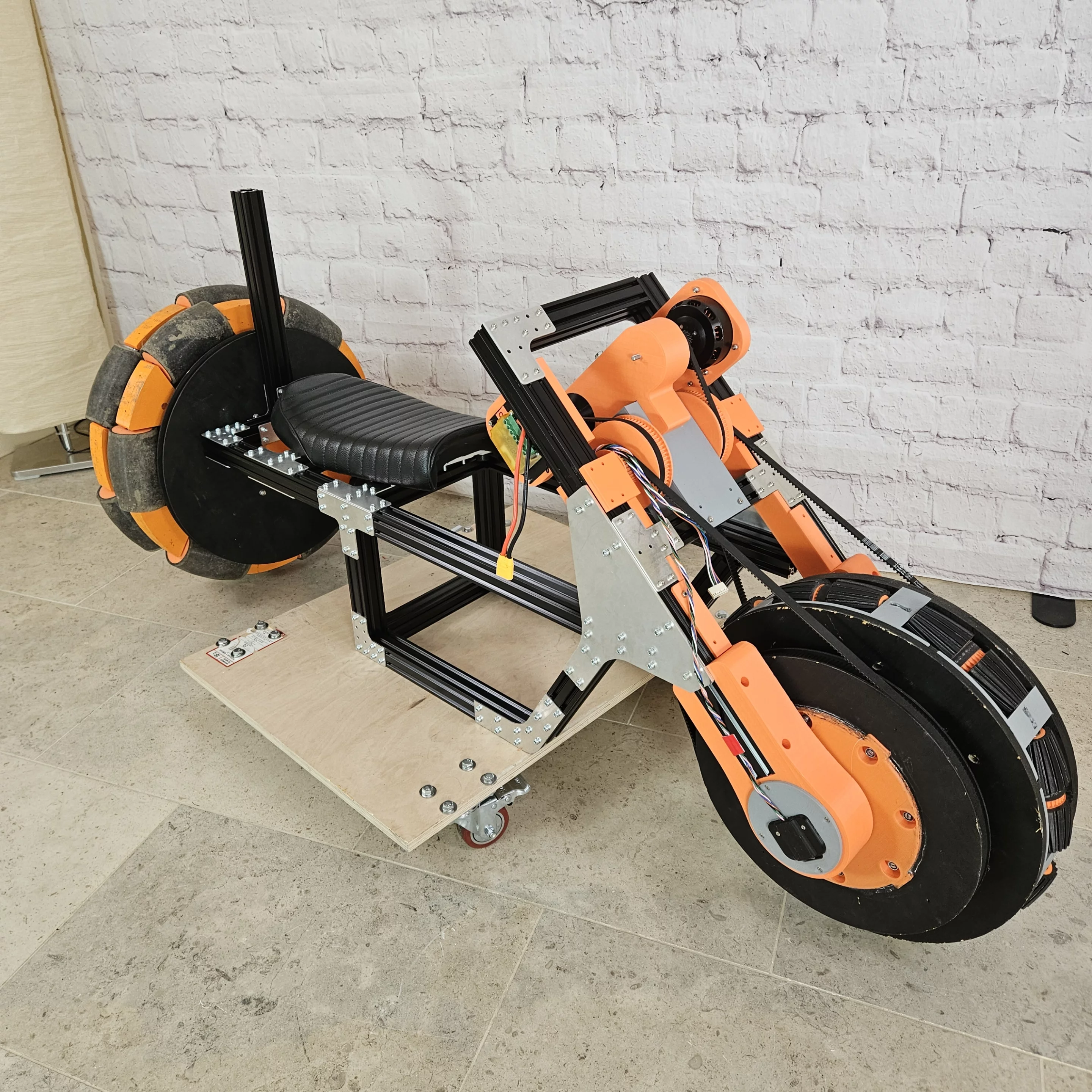 The rear wheel assembly was previously part of Bruton's Speeder Bike, while the fork and front wheel were a self-balancing robot