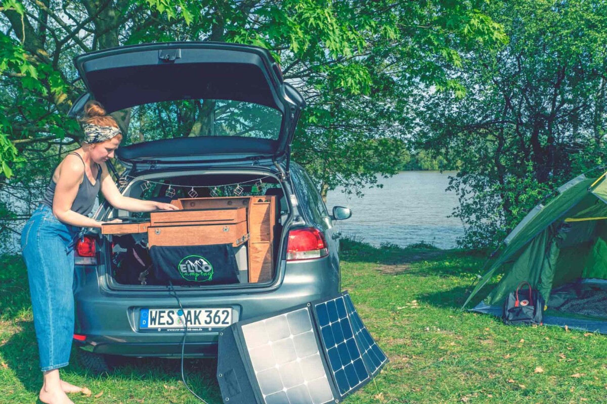 The solar panels set up outside to charge the onboard battery