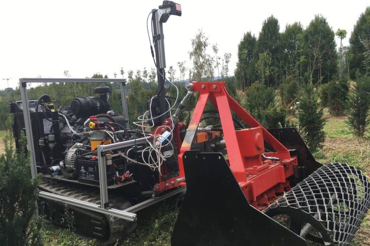 The AMU-Bot, with one of its LiDAR scanners visible at the top, and its rotary harrow in front