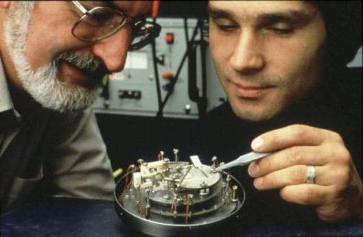Nobel laureates Heinrich Rohrer (left) and Gerd Binnig (right) of IBM's Zurich Research Laboratory, shown here in 1981 with a first-generation scanning tunneling microscope (STM).