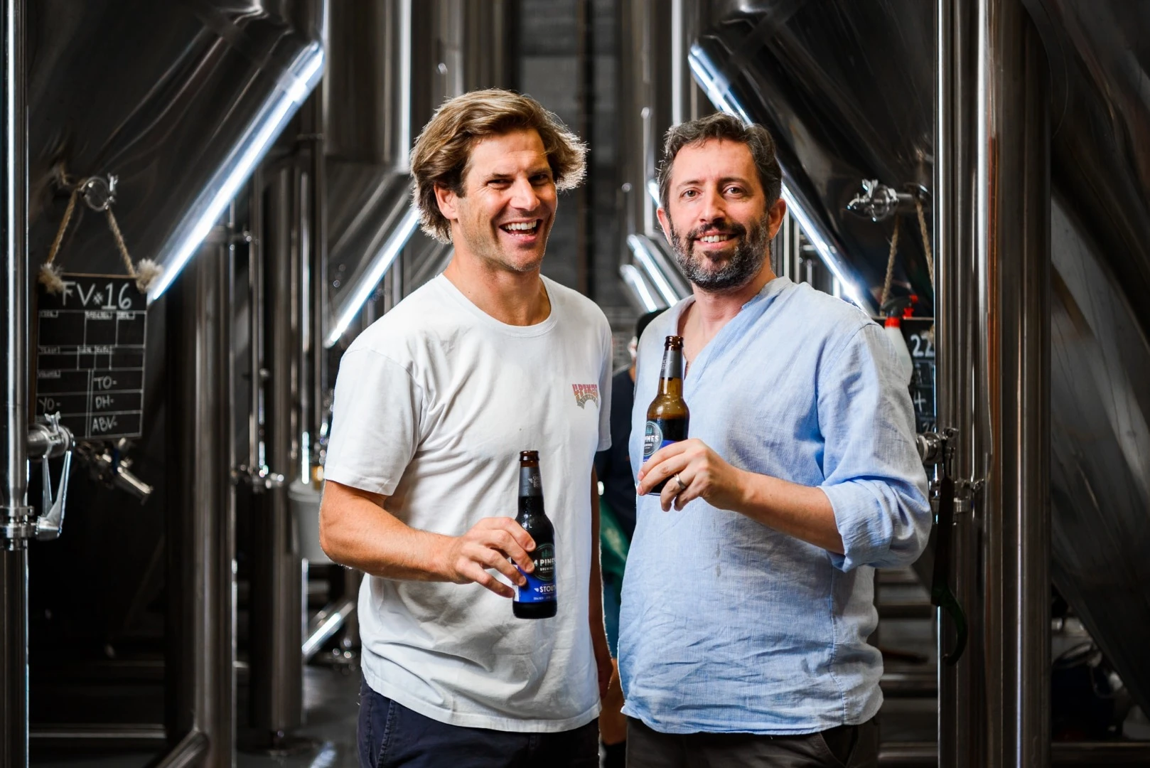 Jaron Mitchell (left) of 4 Pines Brewing Company and Jason Held of Saber Astronautics
