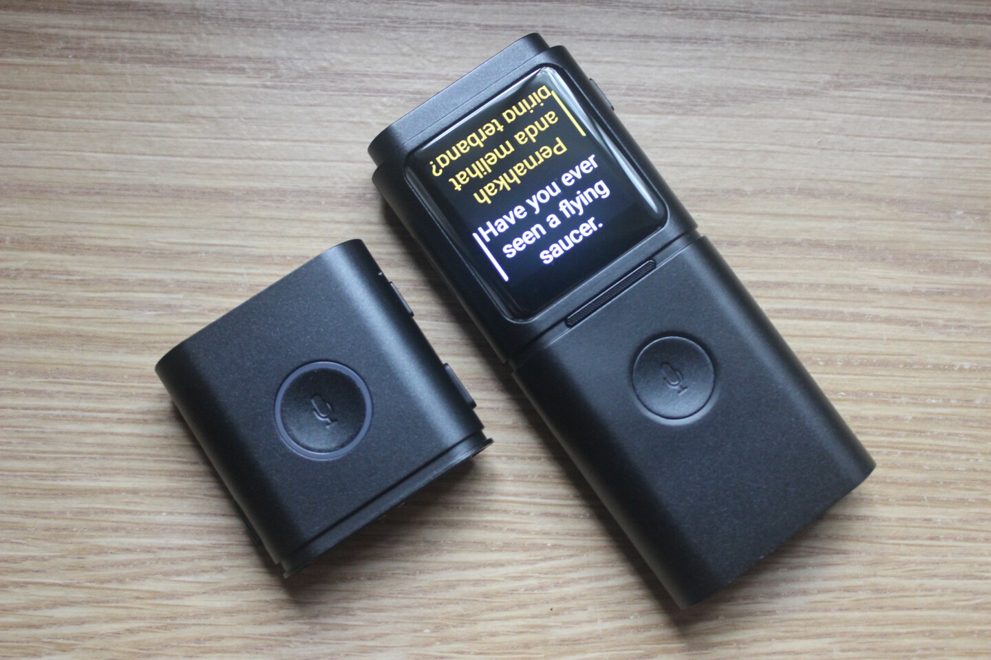 You can detach one of Smark's modules and hand it to the person you're talking to