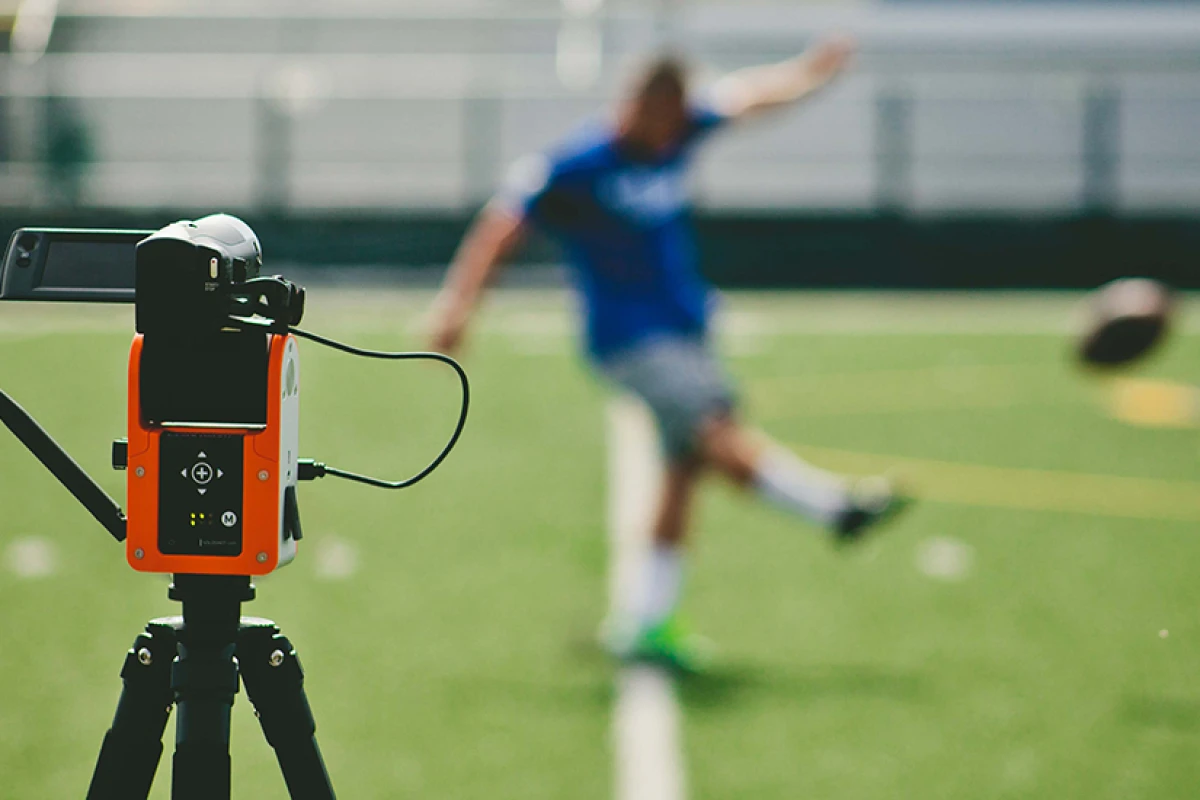 The SoloShot2 pans and tilts the user's camera, to follow them while they're in action