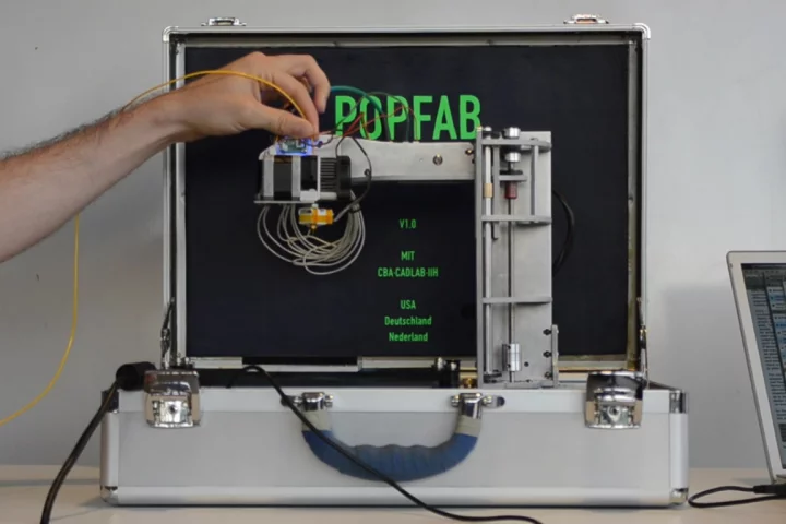 Two MIT students recently developed the PopFab, a machine that does 3D printing, milling, vinyl cutting, and drawing, all while fitting inside a small suitcase