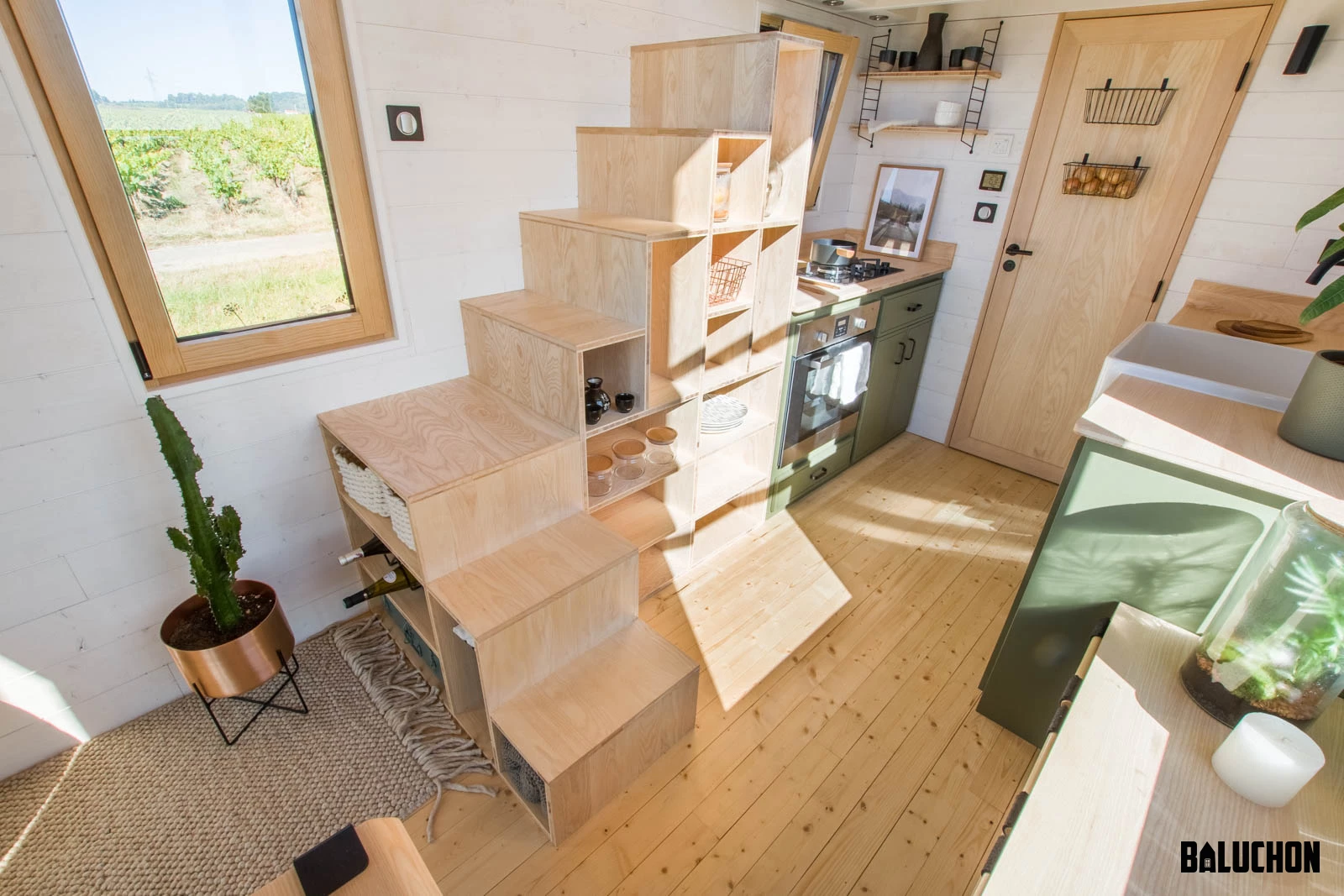 The Tiny House Sauvage's staircase has integrated storage space