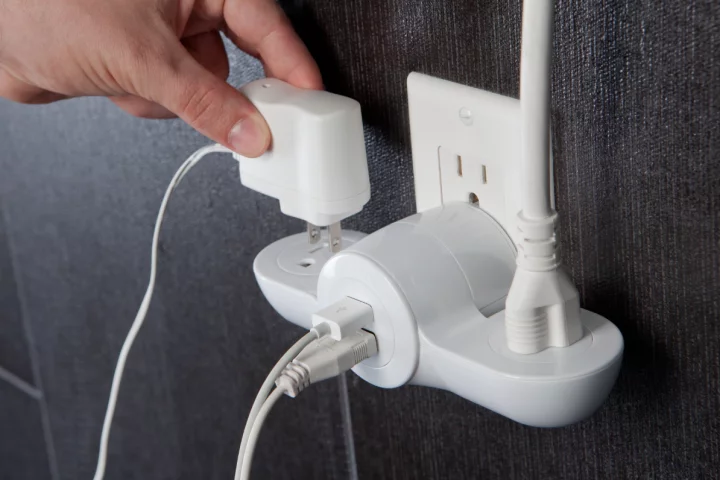 The Pivot Power Mini is a collapsible adapter that transforms one electrical socket into two power and two USB outlets