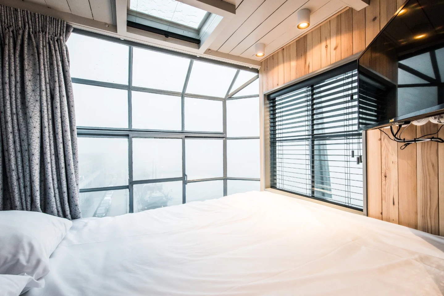 The Yays – Crane Apartment's uppermost bedroom is located in the original machine operator room