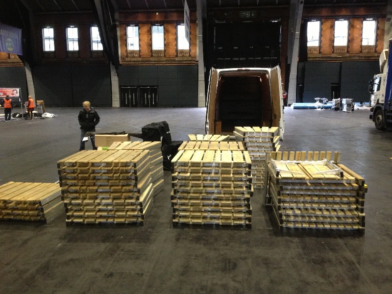 Each kit is flat-packed and shipped within a truck