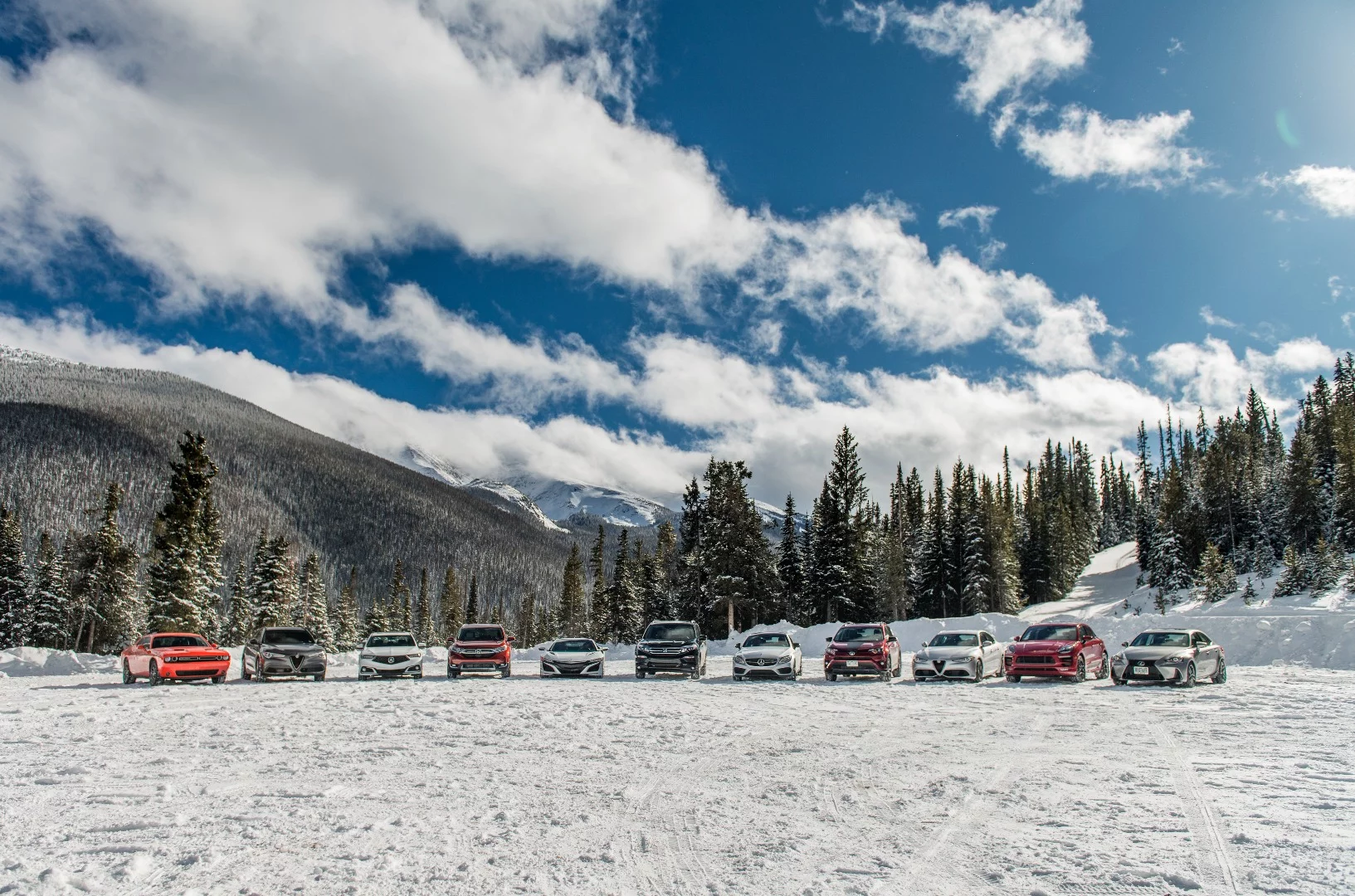 The lineup of vehicles at the 2018 Rocky Mountain Redline Ice Driving Adventure in Colorado