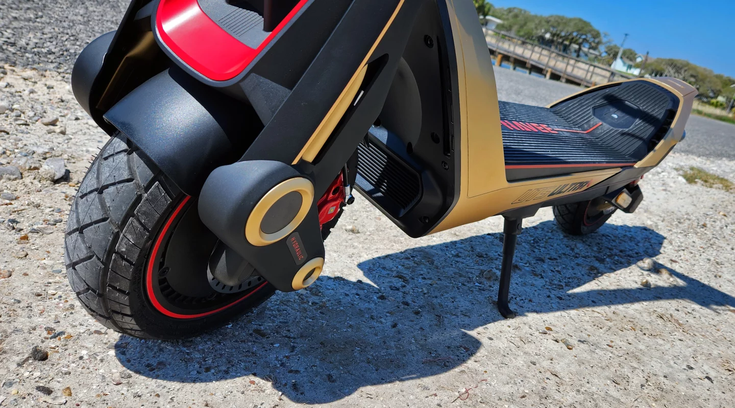 Having ridden through puddles and the like, I can attest that no spray flies off either the front or rear wheel at me