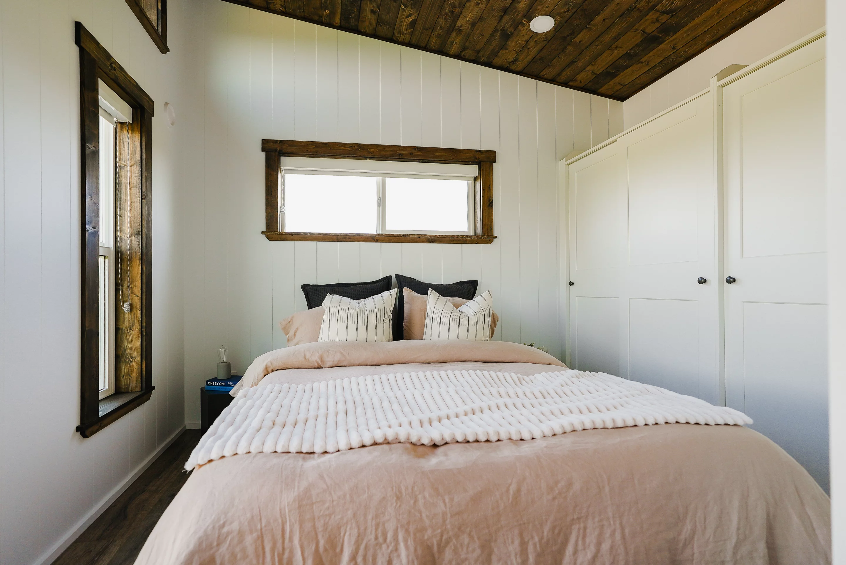 The Orca Edition Park Model's bedrooms have lots of headroom to stand upright, which is quite rare in a tiny house