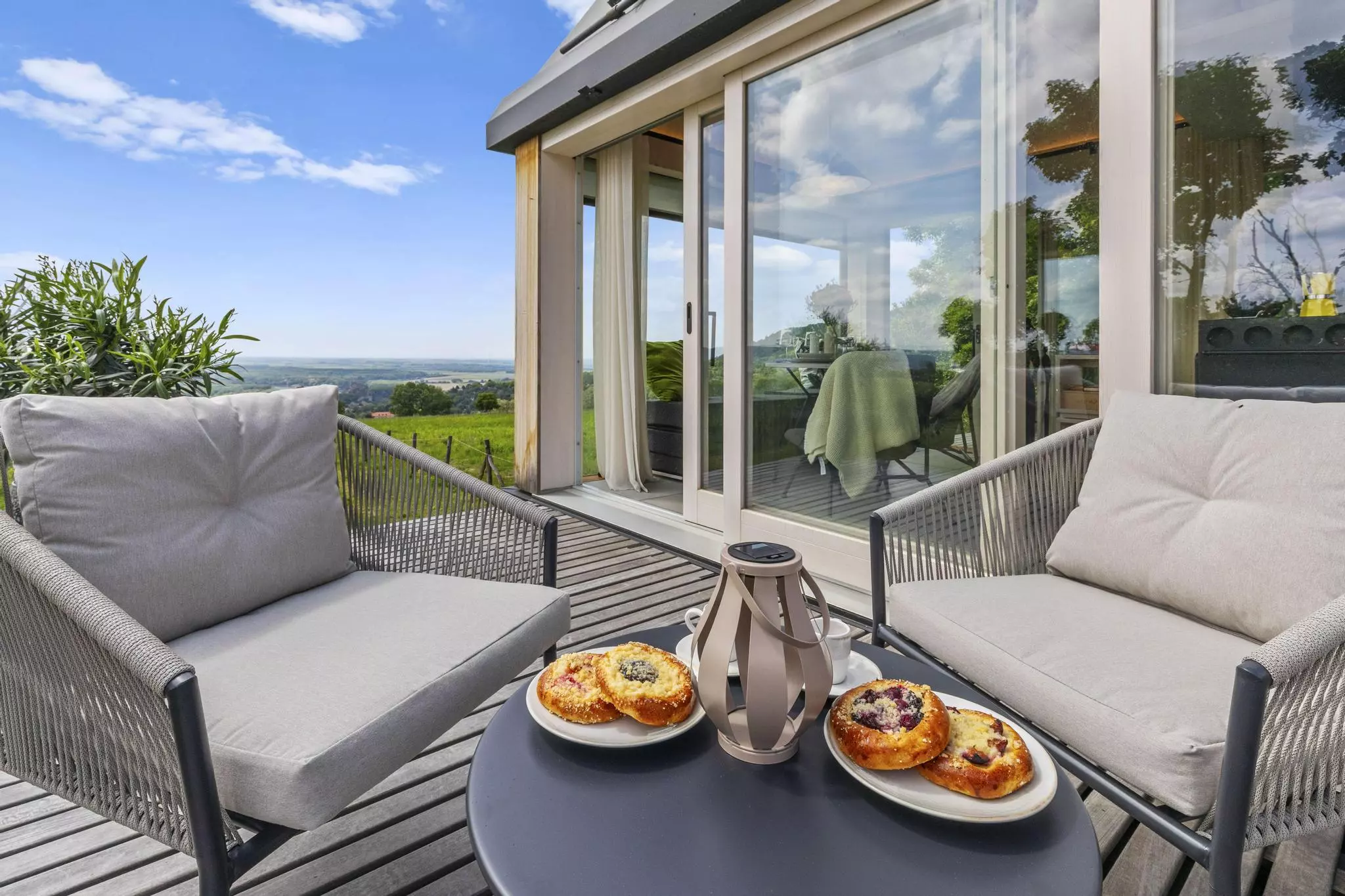 Cabin Devín's terrace areas expand living space outside and are large enough to host some seating