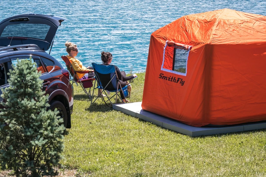 The SmithFly Shore Tent includes windows and doors with rollable covers