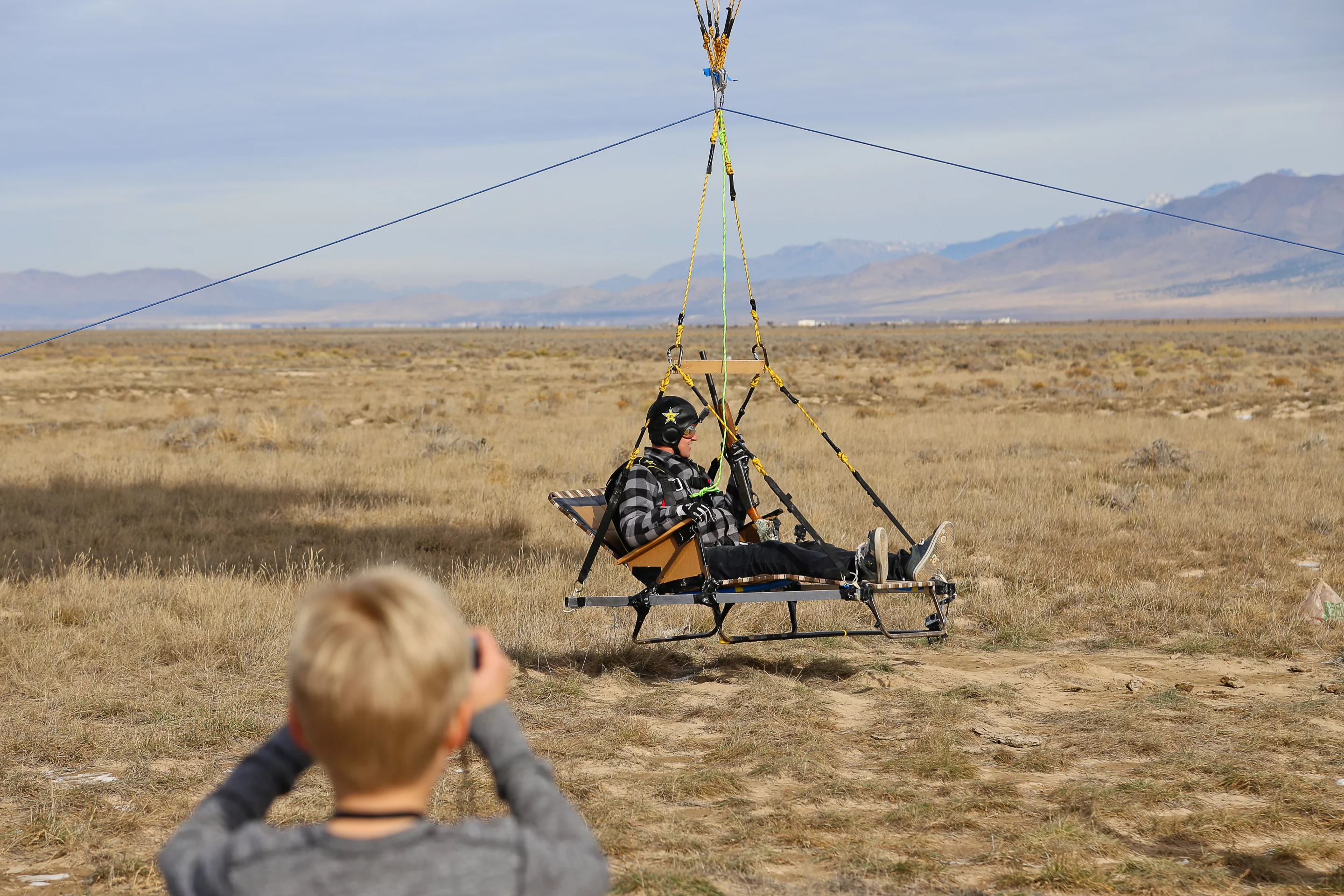 Erik Roner seated in the sun lounger preparing for lift-off