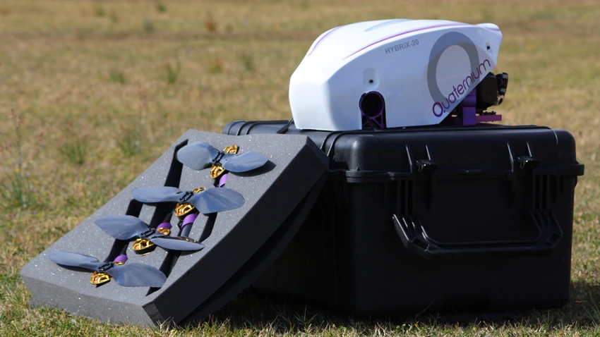 The HYBRiX.20 fuel-electric quadcopter with its box