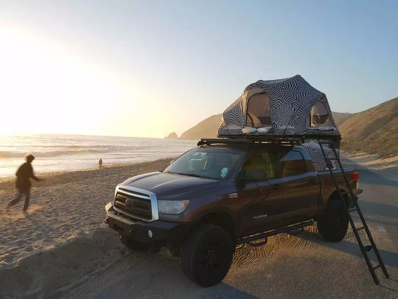 A Rev tent atop C6's own fold-out platform