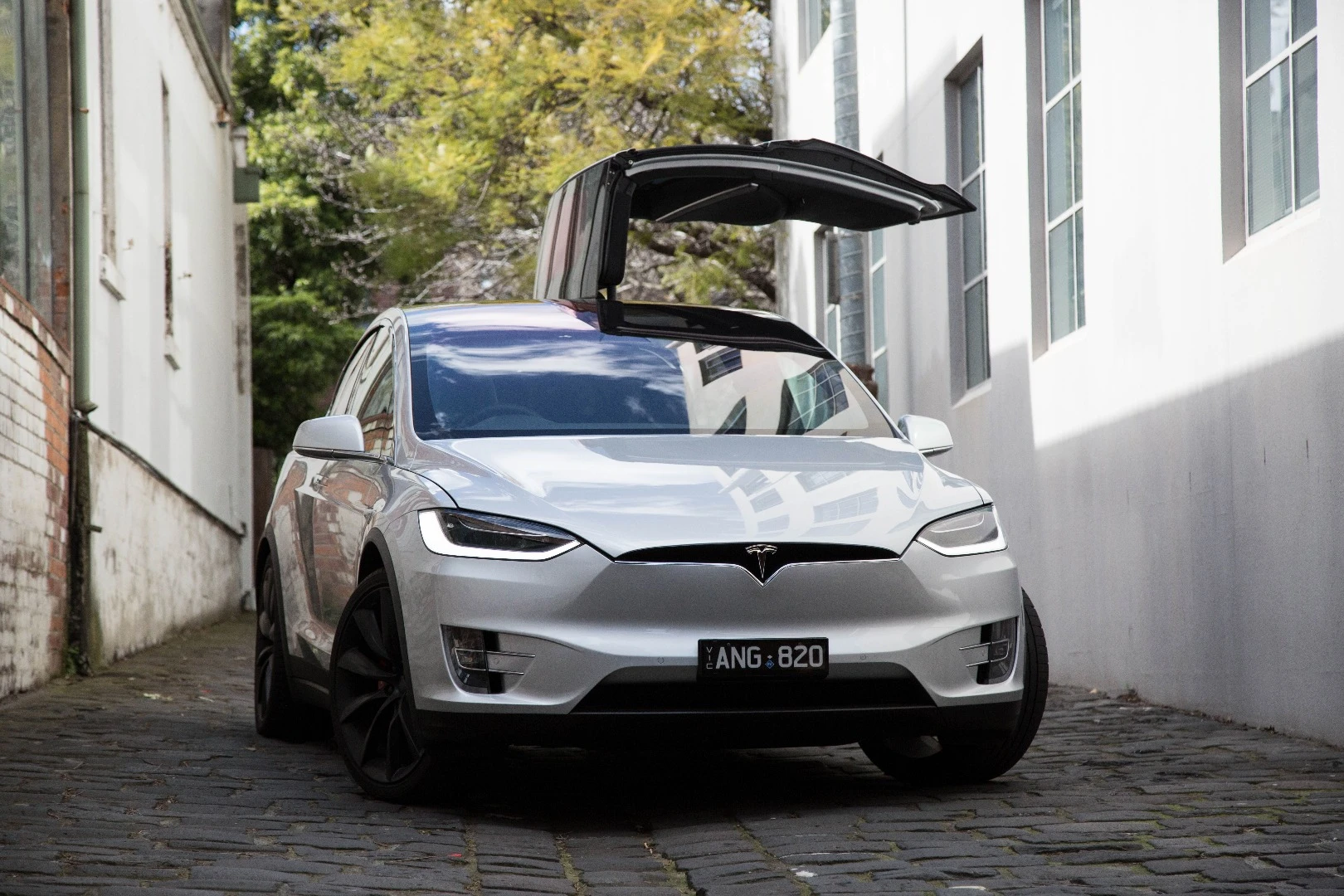 Tesla says the Falcon Wing doors work in just 30 cm of space next to the car