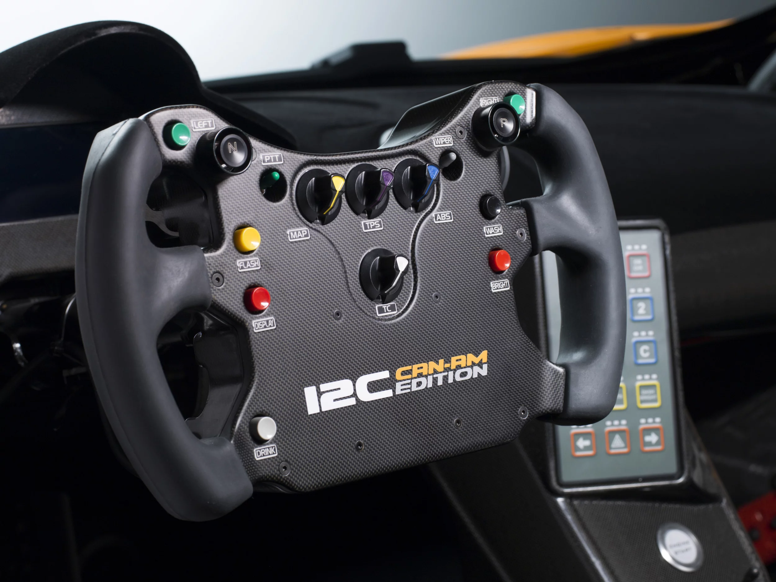McLaren 12C Can-Am Edition racing concept's steering wheel derived from Lewis Hamilton’s MP4-24 Formula 1 car