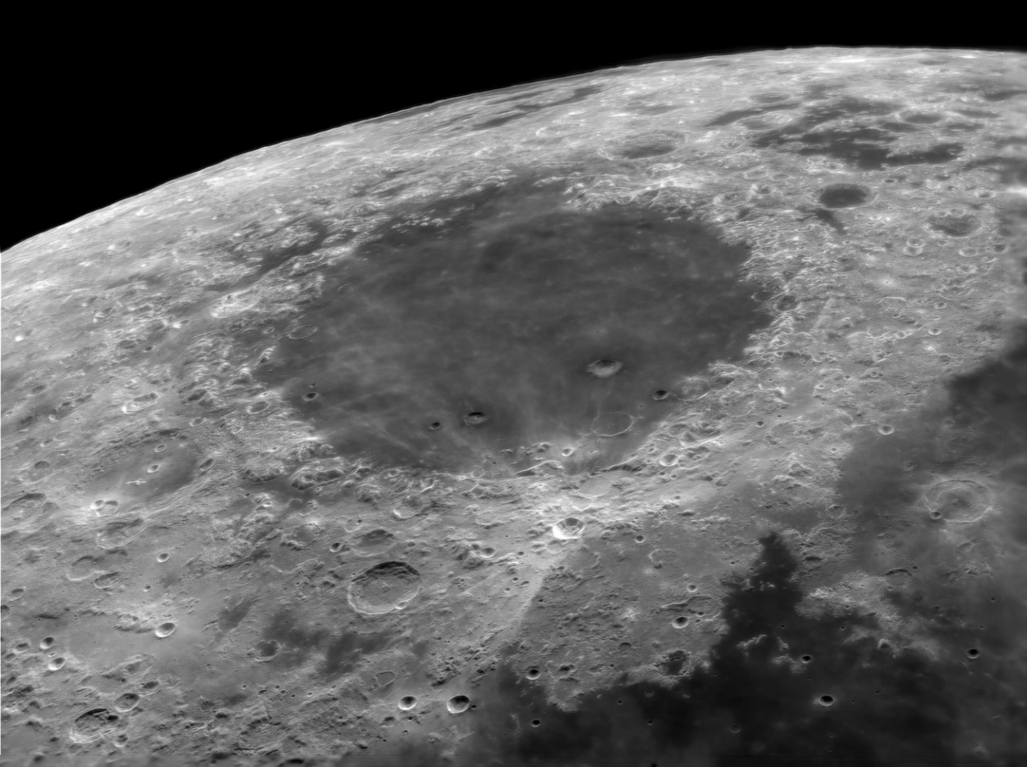This image depicts the Sea of Crises before first quarter, located in the Moon's Crisium basin, just northeast of Mare Tranquillitatis and the shallow cliffs around the top of the Mare slope gently down to the 'shore’. The photograph was taken during the exceptional seeing conditions during the week the UK experienced the 'Beast from the East' storm in February 2018. Yeovil, Somerset, UK, 22 February 2018