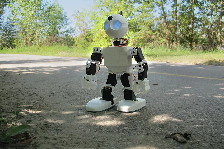 The JD robot walking outside