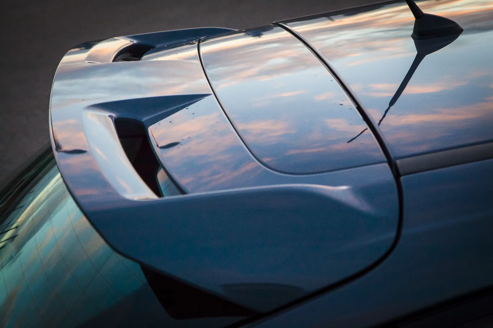 We're not sure if there's any real downforce created by the rear wing, but it fits in with the car's slight boy racer bent