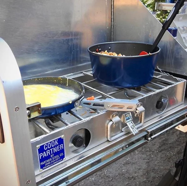 OverKill offers an optional Partner Steel stove on its slide-out
