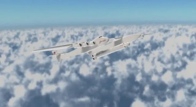 The Stratolaunch carrier aircraft releasing the booster rocket