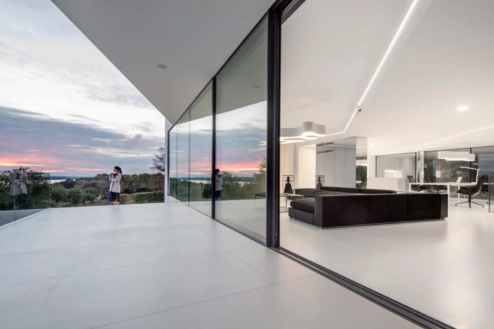The By The Way House features a first floor wrapped in a singular looping element