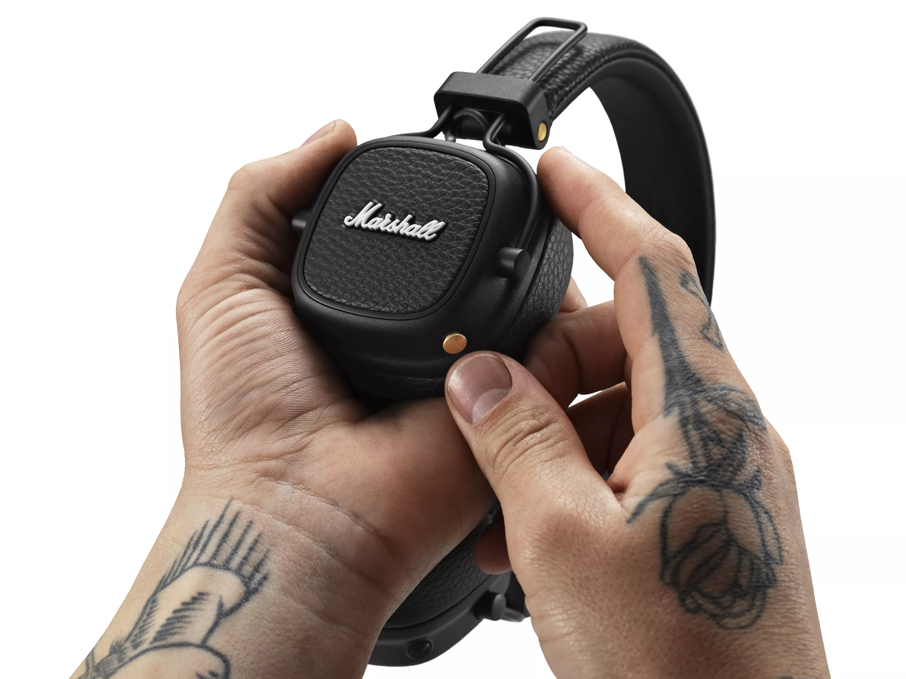 A multi-directional control button is used to play, pause, shuffle and adjust the volume of your music