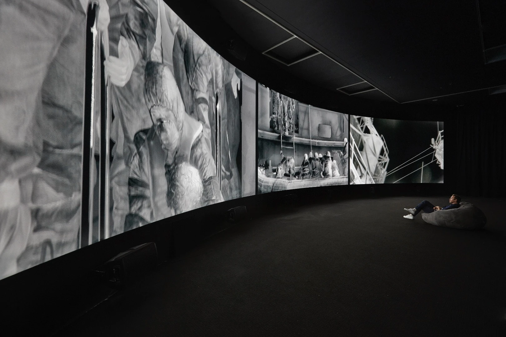 Installation view of Richard Mosse Incoming 2015 – 2016 which is on display in NGV Triennial at NGV International, 2017