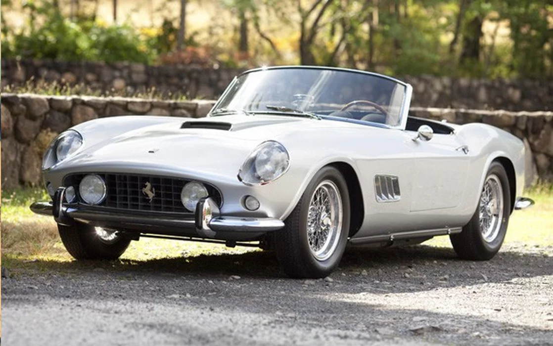 An alloy 1959 Ferrari 250 LWB California Spider Competizione with some credible racing results including fifth outright in the 1960 12 Hours of Sebring and third outright at the 1960 Nassau TT, matching numbers, certified by Ferrari Classiche, documented by Ferrari Historian Marcel Massini. Sold for US$7,260,000 at Pebble Beach in 2010 by Gooding & Co