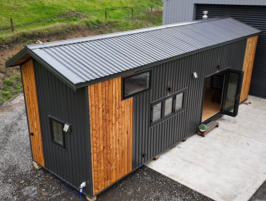 Spacious tiny house is designed with full-time living in mind
