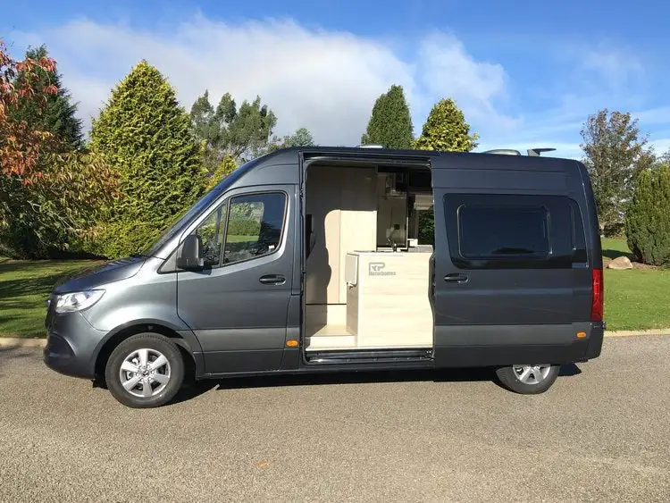 RP fits the Sprinter with a well-equipped kitchen, bathroom (slide-out compartment optional), rear bed or convertible lounge and more