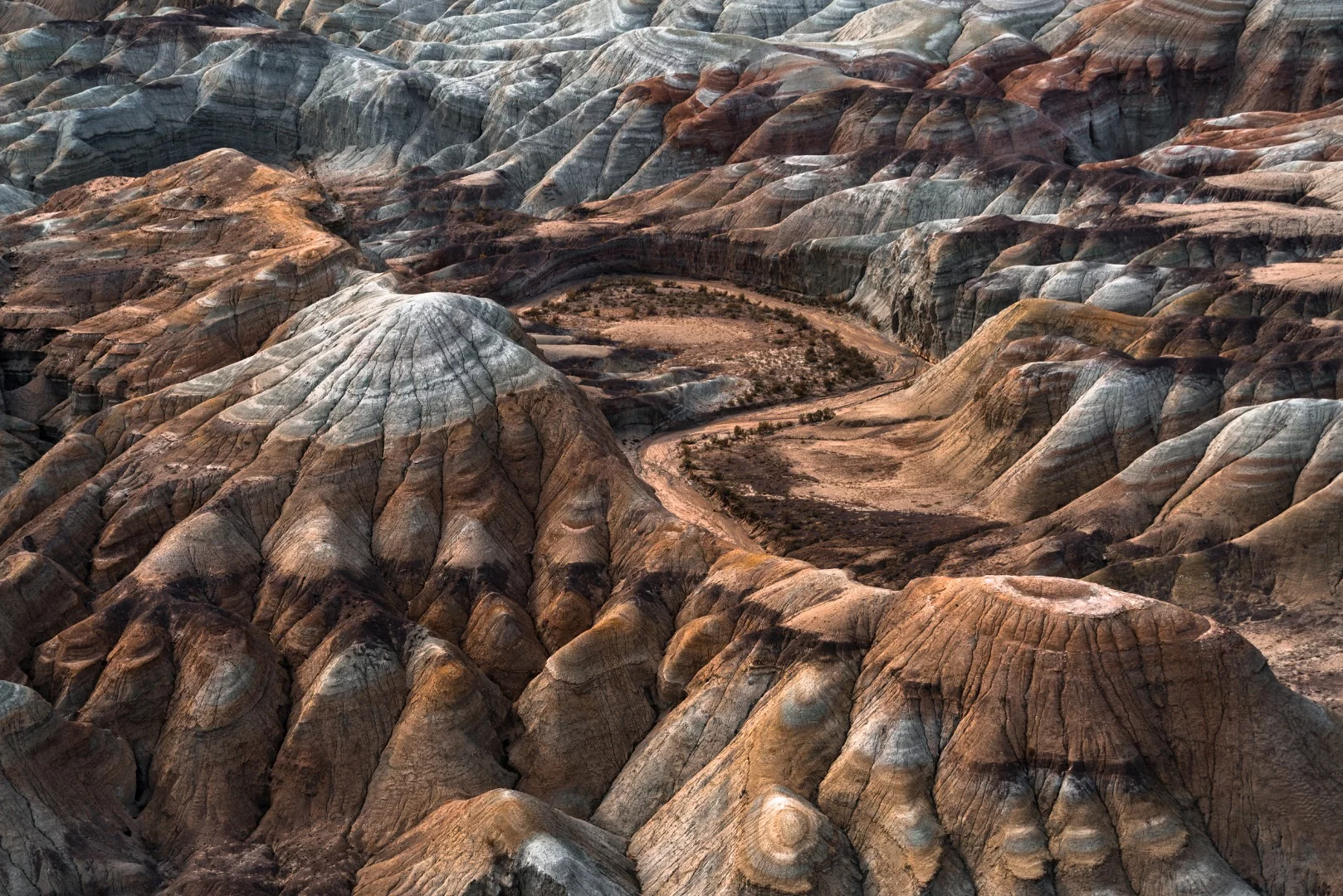 The aerial shot was taken in Altyn Emel National Park, Kazakhstan from a small plane