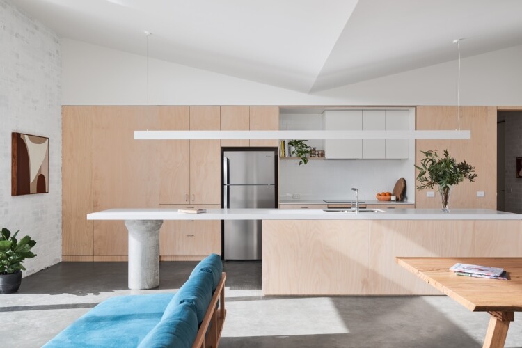 The interior of the home features a large contemporary kitchen which overlooks the open plan living and dining areas