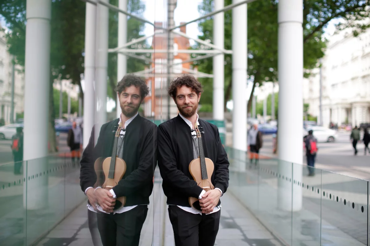 Luca Alessandrini with his prototype violin