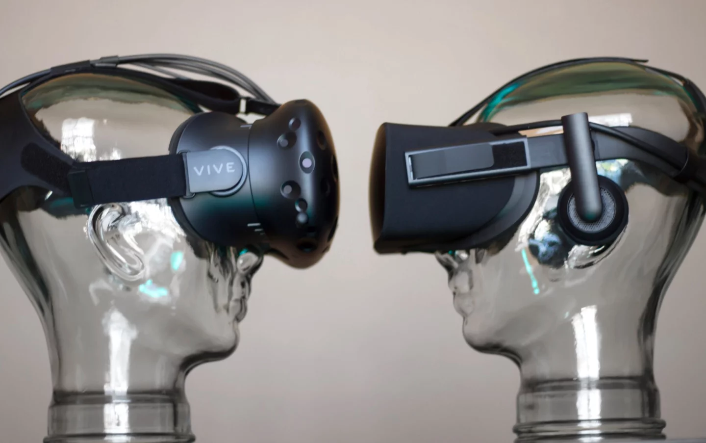 HTC Vive (left), with Oculus Rift