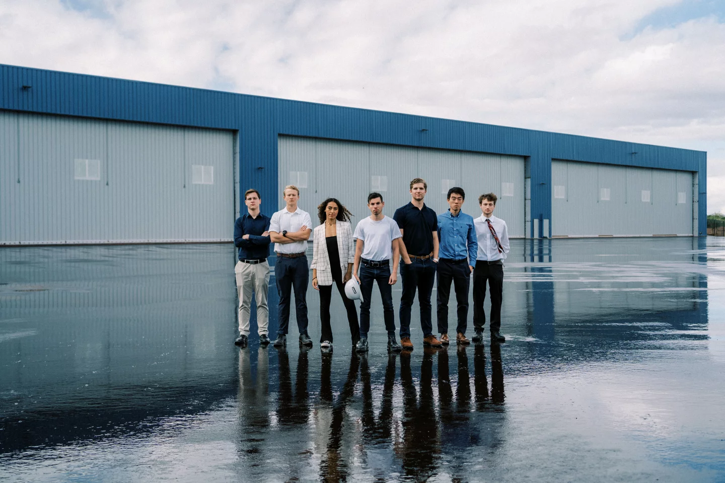 Christian LaRosa, center, with members of the Rosotics team, looking like they've just dropped a banger of a record