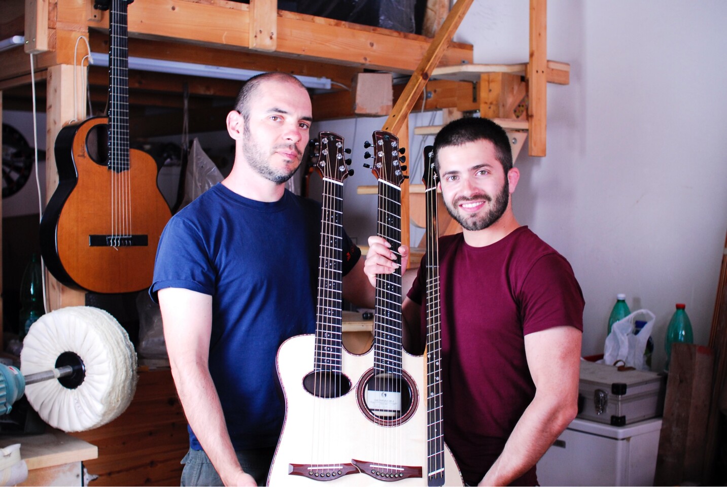 Luca Stricagnoli (right) with his luthier friend Davide Serracini (left) and the Reversed Triple Neck Guitar in the middle
