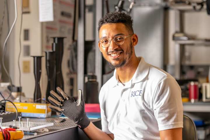 Marquise Bell models one of his antiviral gloves