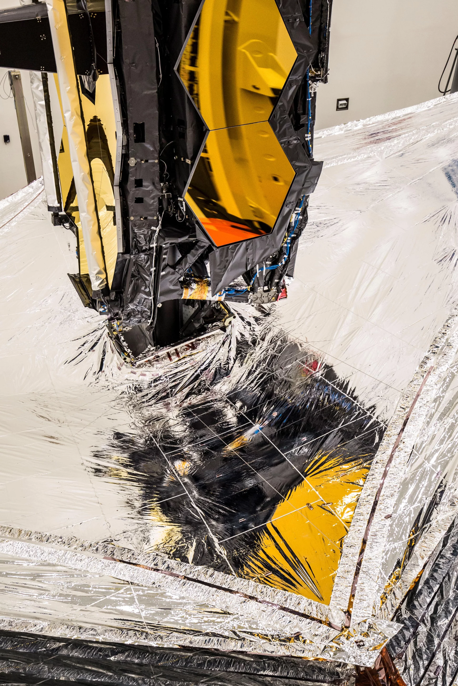 The sunshield membranes are as thin as a human hair