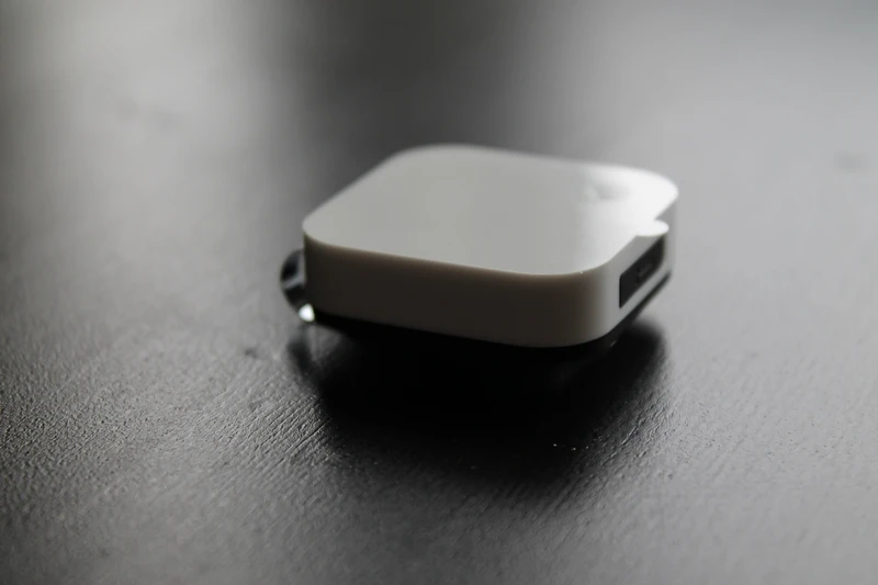 A small piece of black plastic covers the USB port