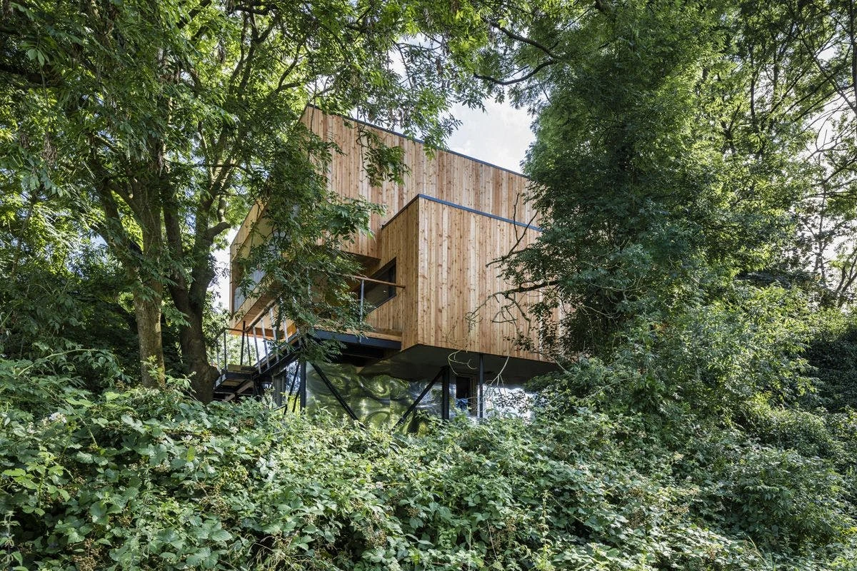 The Dursley Treehouse is a Passive House for a family, built above a series of screwpiles specifically designed for minimal impact on the ground