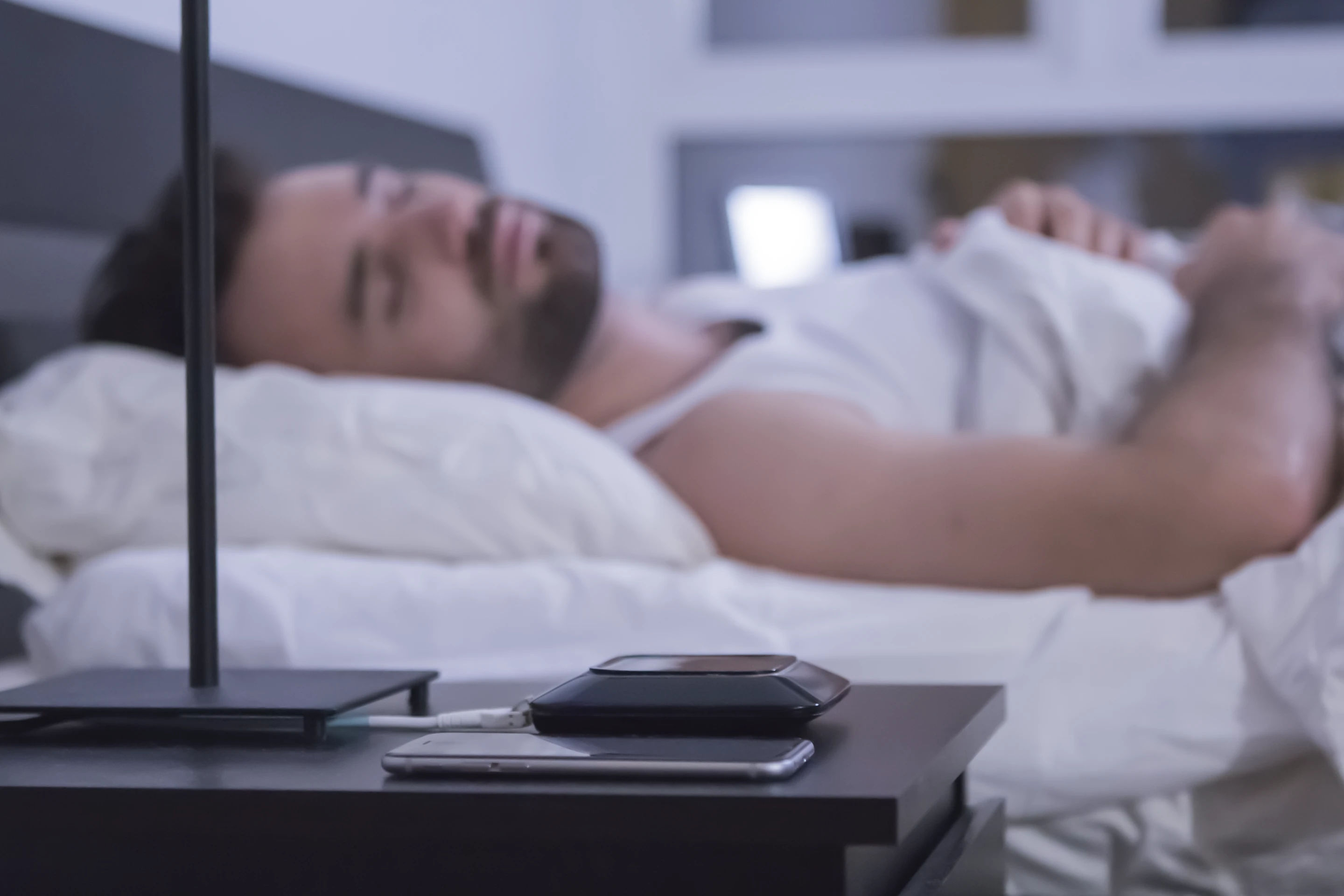 A fiber-optics band fits under a mattress and tracks metrics such as heartbeat, breathing and room temperature through the night